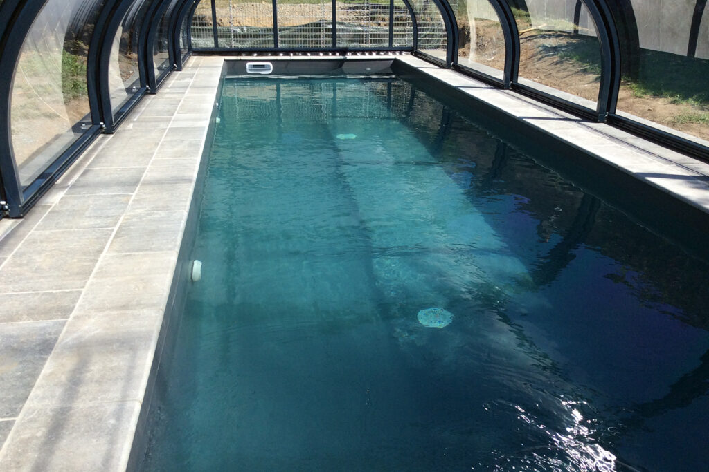 L'abri de piscine plat et le concept Outdoor avec Bonheur Piscines